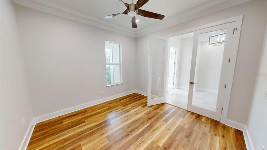Den double glass doors and great room
