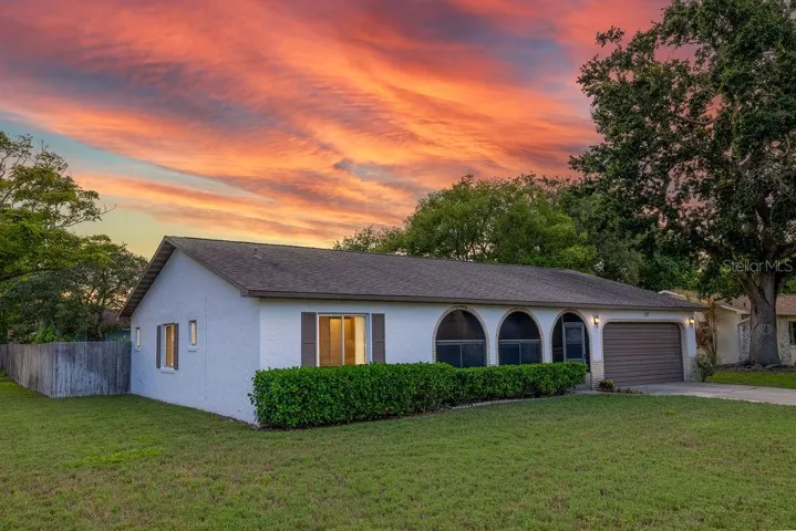 Amazing Corner Lot! Fully fenced with inground screened pool!