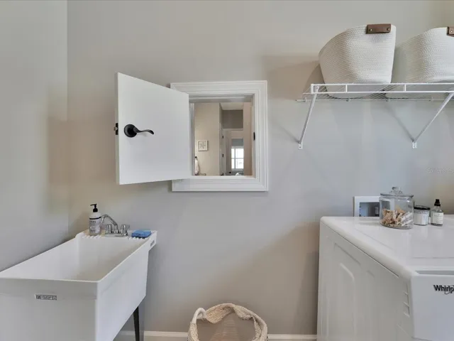 Convenient door between the laundry room and the primary's walk-in closet!