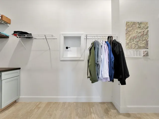 Wire shelving has been upgraded to wood shelving since this picture was taken.
