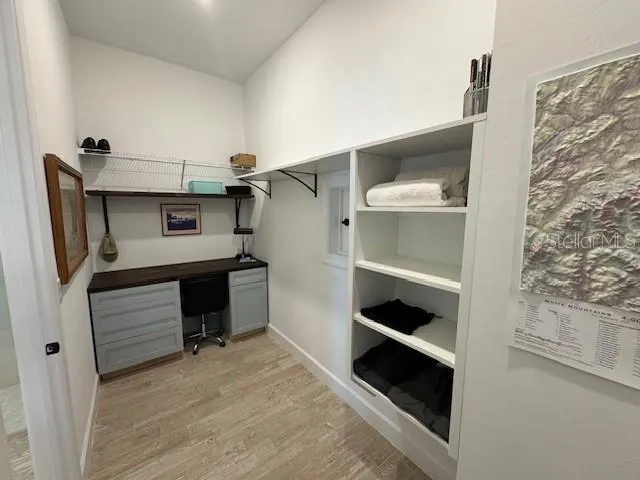 New built-in shelving in primary walk-in closet - July 2024