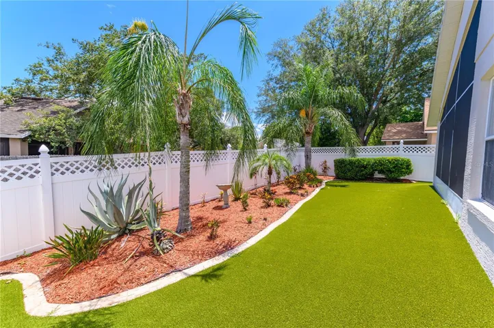 Artificial turf backyard = minimal maintenance!