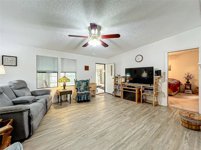 Living room and access to the side FL room