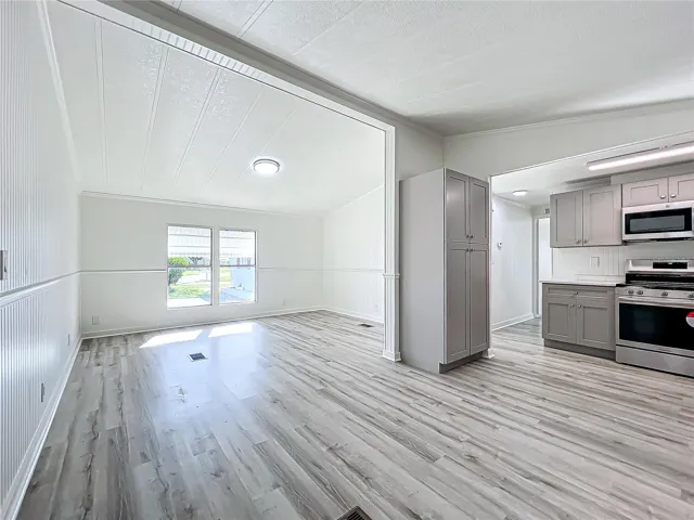 Front room and view into the kitchen