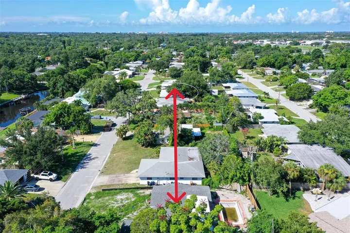 Distance from 3430 Jaffa Drive to a house down the street being totally renovated with new pool, etc.