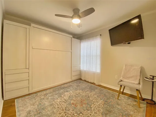 Murphy Bed in Guest Bedroom is a Space Saver