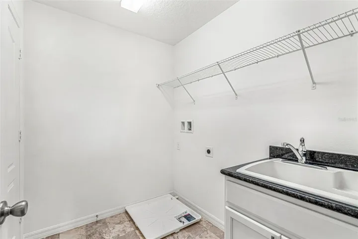 laundry room with sink