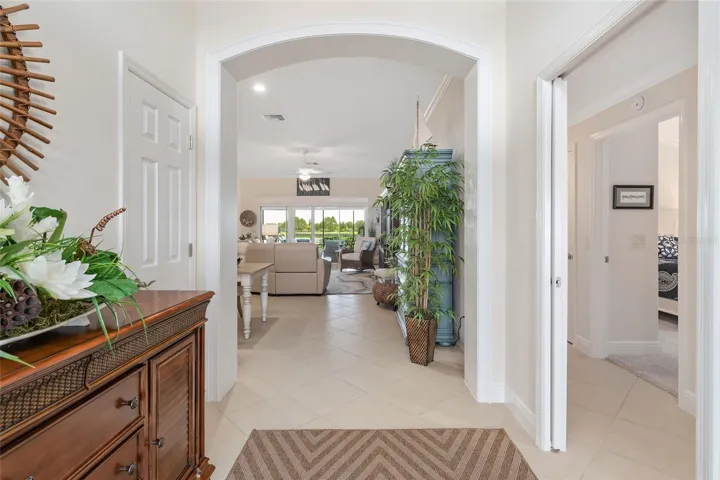 GUEST WING TO RIGHT OF FOYER HAS POCKET DOOR FOR ADDED PRIVACY.