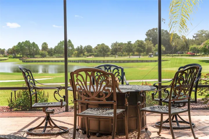 FIREPIT TABLE AND CHAIRS REMAIN WITH THE HOME AND PROVIDE ANOTHER OPTION FOR DINING OR ENJOYING THE VIEW.