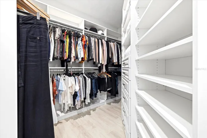 His and hers built in custom closets
