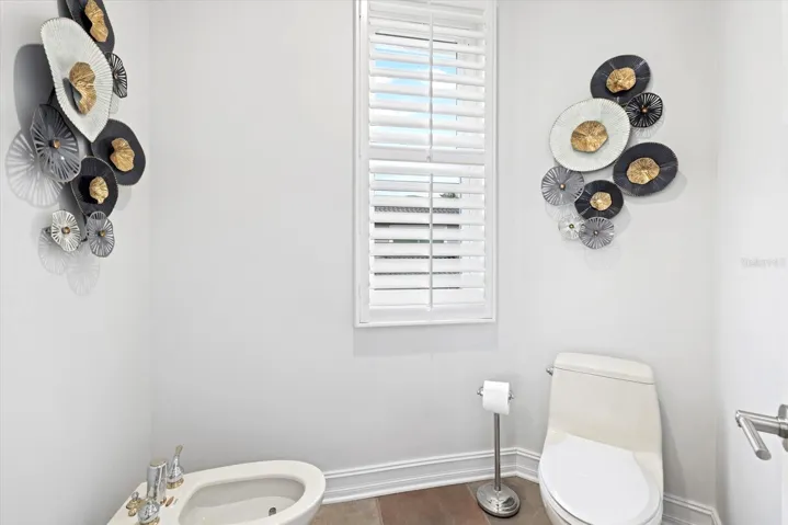 Bidet and toilet closet in primary bathroom