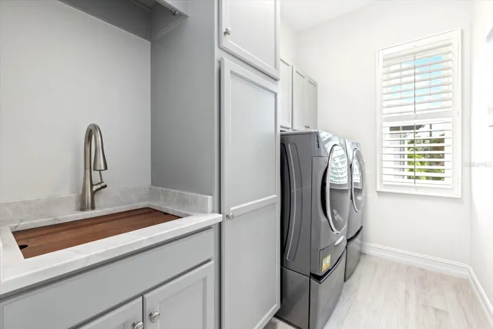 Laundry Room next to the 2nd bedroom and kitchen.