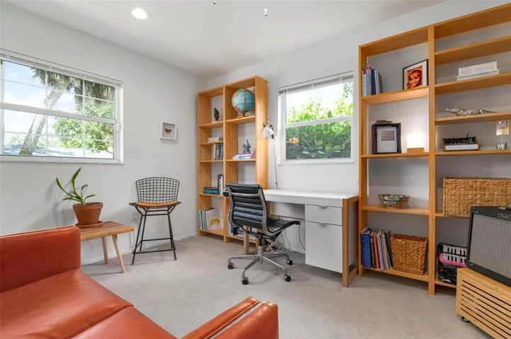 The closet in this bedroom isn't in the photo but it is located to the right of the sofa when facing the sofa.