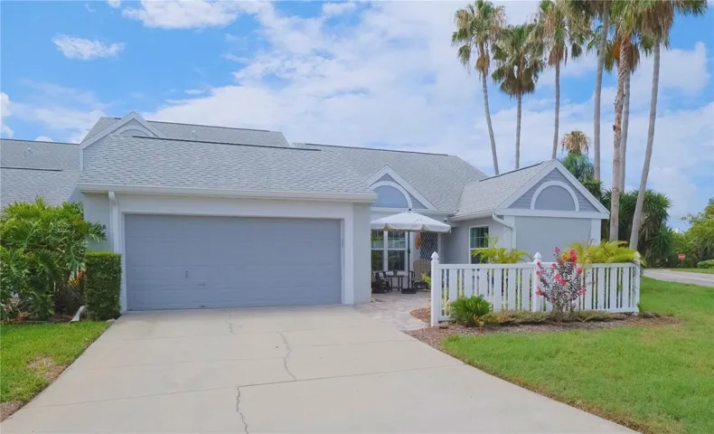 EXQUISITE UPDATES IN A TROPICAL OASIS w DOUBLE GARAGE!
