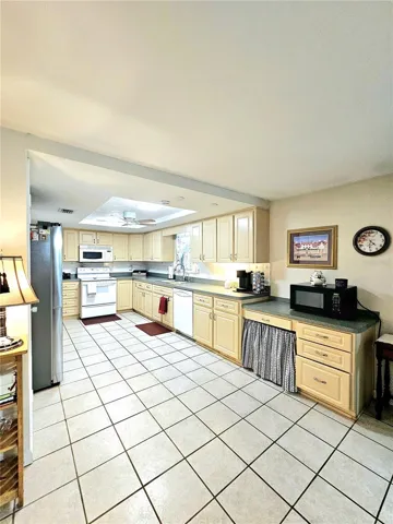 Owner's photo of kitchen before moving in.