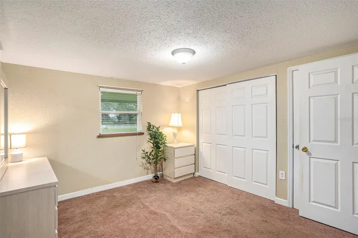 Guest bedroom has large closets and good natural light!
