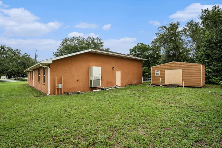 REAR VIEW GARAGE + SHED AND RV HOOKUP