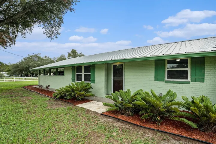 SOLID block construction with a new metal roof!