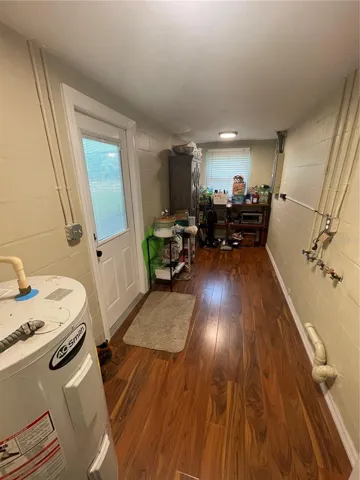 Just off the double carport is this handy mud room/utilty room -could be an awesome pantry with some shelving!!!