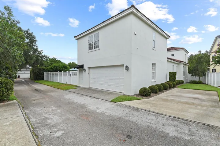 Rear Alley Access plus a parking pad