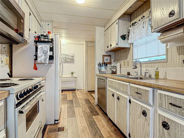 The kitchen has an updated dishwasher