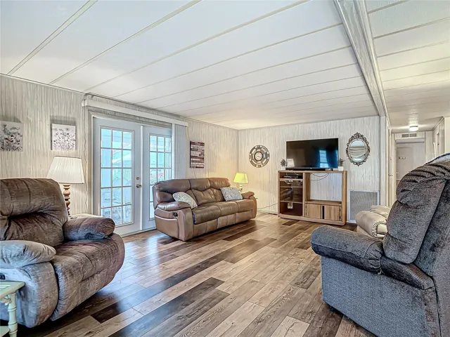 Living room with French doors into the Florida room