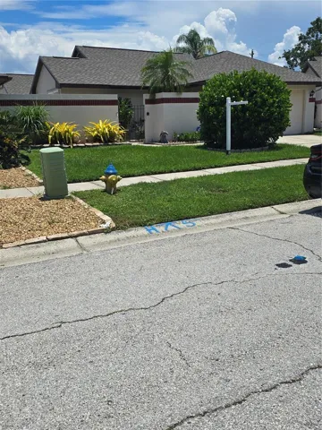 FRONT OF HOUSE- SINGLE FAMILY HOME- ZERO LOT LINE