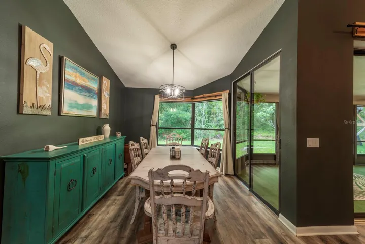 Dining with view of preserve in back yard