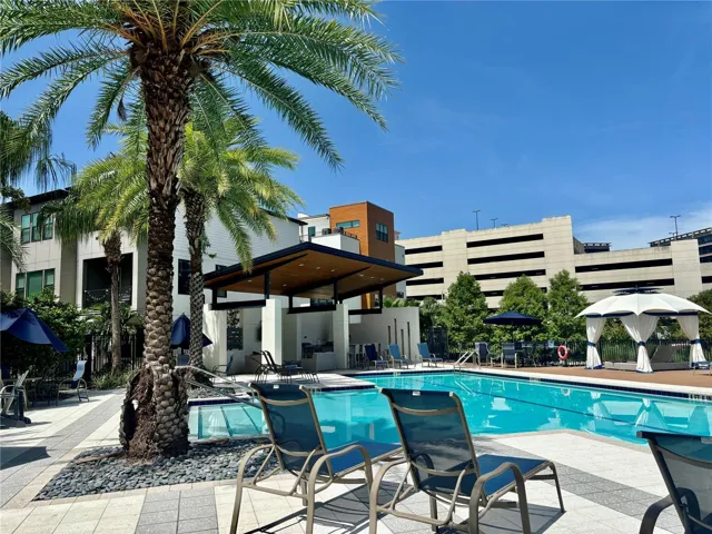 Community pool with outdoor kitchen and owners only restrooms