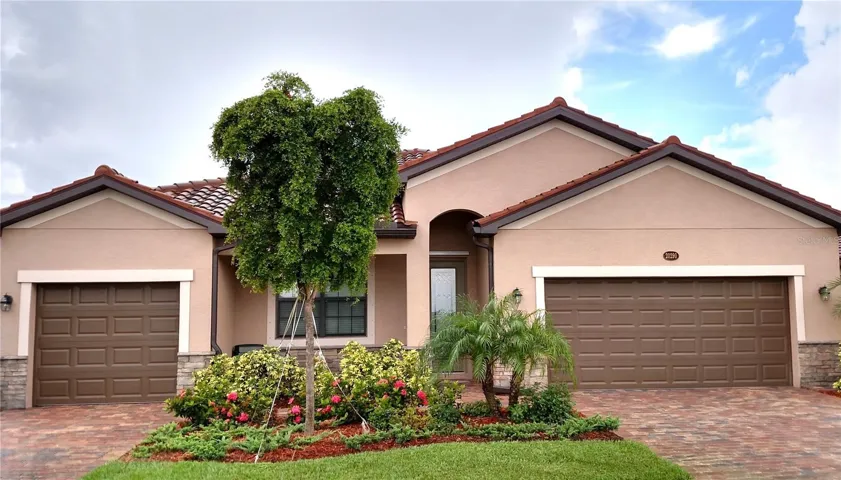Meticulously maintained Tuscan-style home