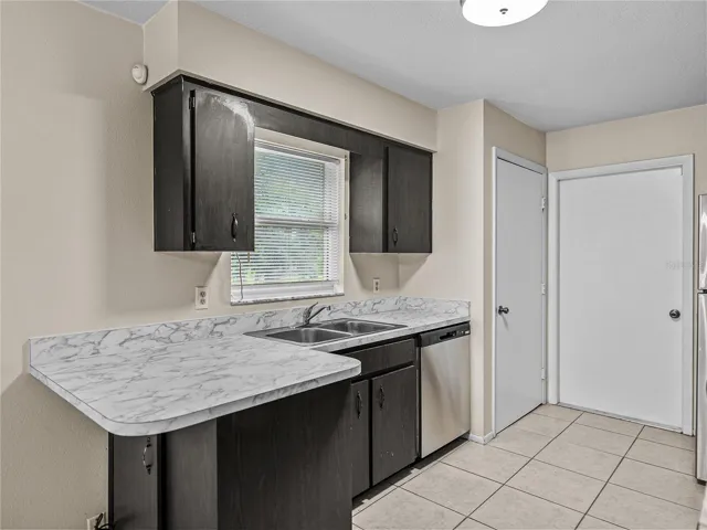 Kitchen with all new stainless steel appliances & closet pantry