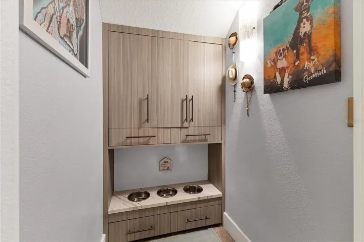 Under stair storage converted to dog room