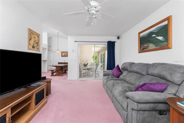 Sliding glass doors from the living room lead to the lanai