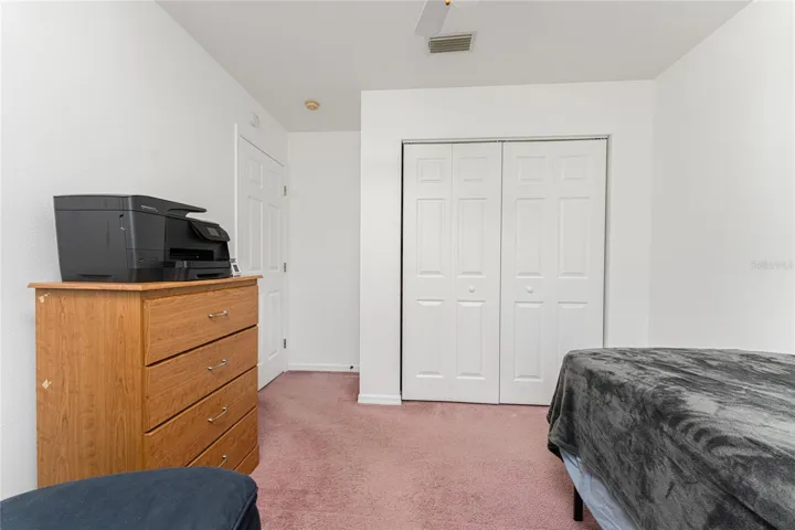 Guest bedroom #3 has a wall closet.