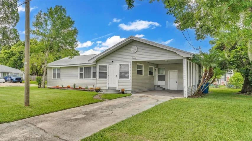 Carport & Laundry Room Enclosed Behind It