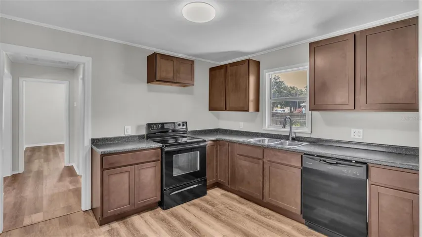 Kitchen - Hallway leads to Bedroom #2 & #3