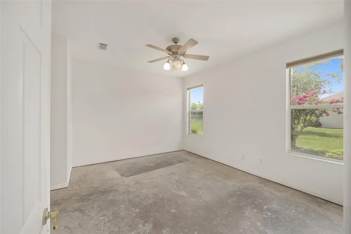 Primary bedroom looking at back yard