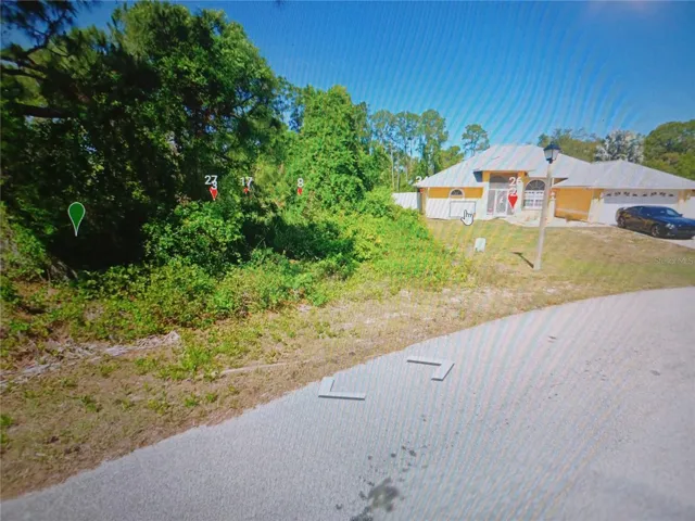 Lot is next to a house. Electric nearby