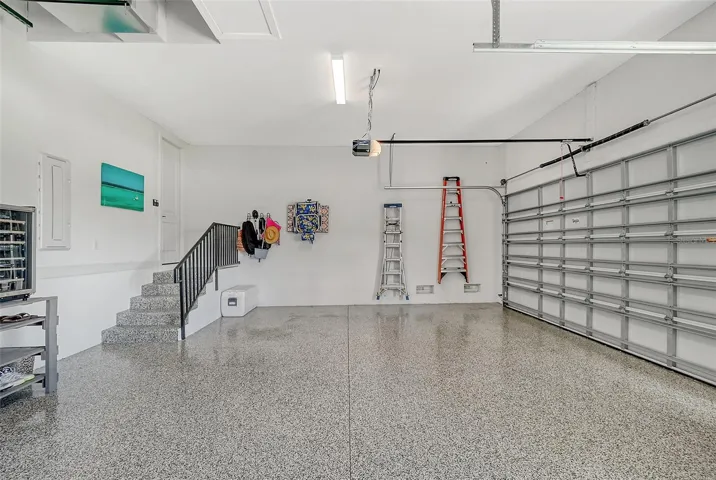 oversize 3 car garage with premium flooring