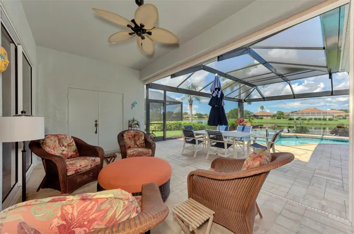 L shaped lanai providing multiple seating areas