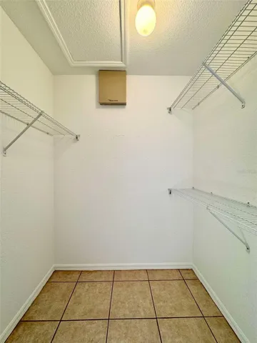 PRIMARY BEDROOM WALK-IN CLOSET