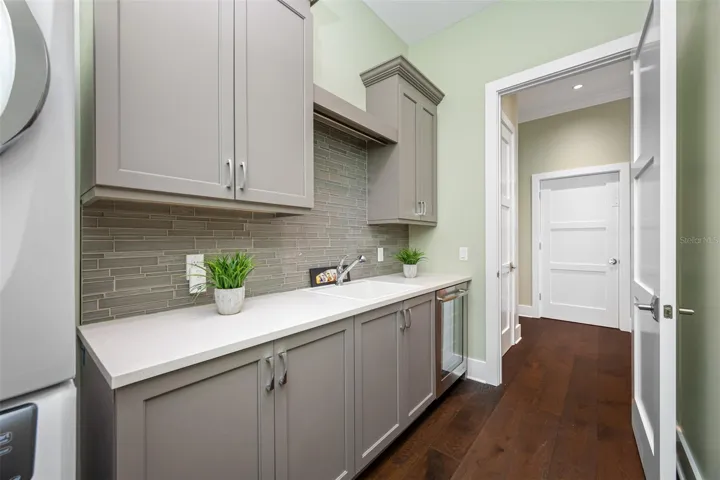 Fantastic Storage cabinetry in laundry room