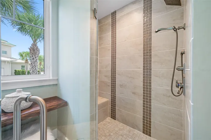 Primary Suite walk in shower seamless glass