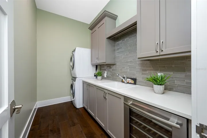 Laundry Room Full Size W&D, Laundry Sink and Wine Fridge