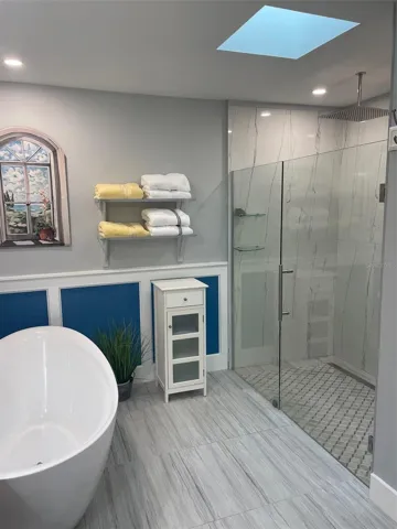 Glass shower doors and sky lite