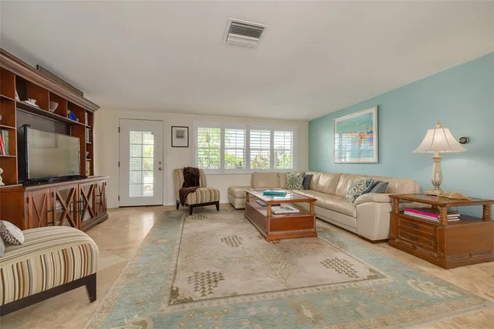 Stone floors throughout the home