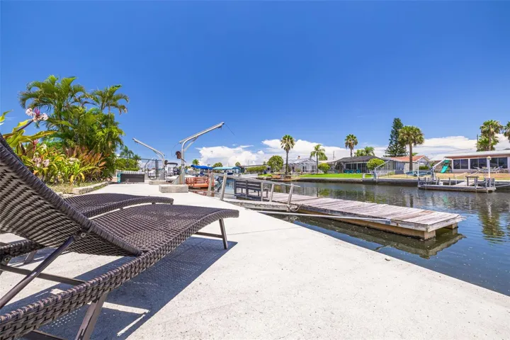 Large cap on seawall and large floating dock