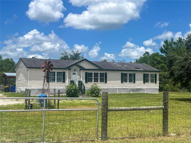 Fenced in property, ready for its next owner!