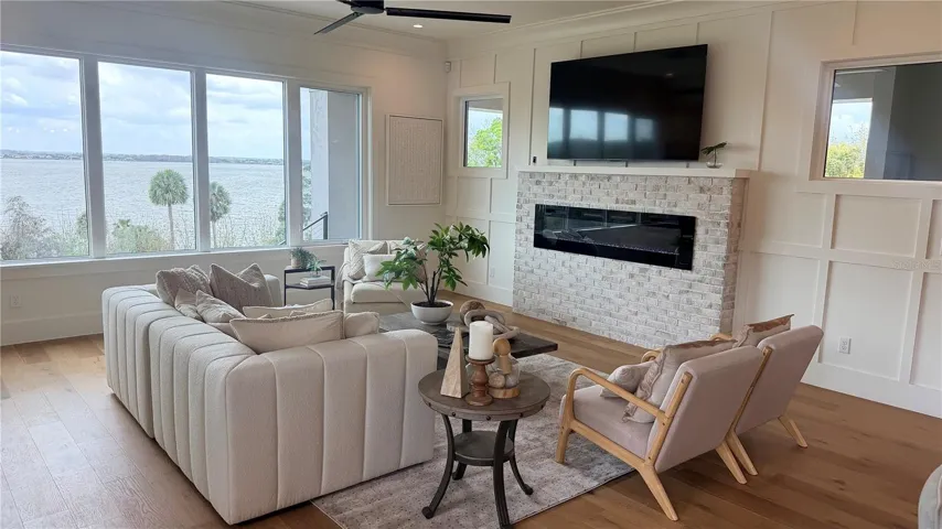 Great room & fireplace with lake view