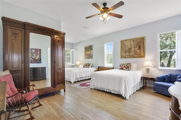 Primary bedroom is large with enough room for a sitting area or two beds.